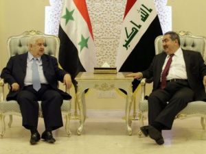 وزير الخارجية السوري وليد المعلم (يسار) ونظيره العراقي هوشيار زيباري في بغداد