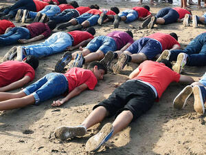 About 30 people in Rabat, Morocco pay a tribute to Aylan Kurdi, a Syrian boy who was found dead on the Turkish shore. (AFP/File)