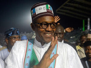 Former military ruler and presidential candidate Muhammadu Buhari is significantly in the lead with at least nine states in Nigeria counted. (AFP/Pius Utomi Ekpei)