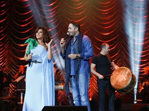 Ramy Ayyach and Najwa Karam perform on Stars on Board. (Bitajarod)