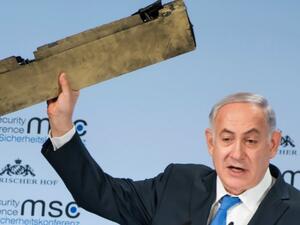 Israel’s prime minister has said his regime could “act” directly against Iran, showing off what he called a piece of an Iranian drone which the Israeli military claims to have downed more than a week ago. (AFP) 