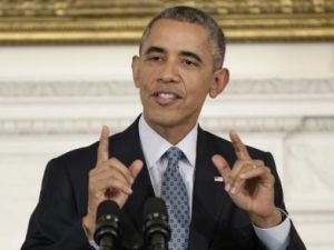 اوباما اثناء مؤتمر صحفي في البيت الأبيض بواشنطن يوم الجمعة
