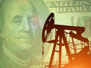 The U.S. dollar inched higher versus a basket of major currencies on Tuesday. Oil markets were split. (Shutterstock)