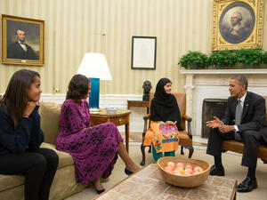 This official White House photo shows President Barack Obama, First Lady Michelle Obama, and their daughter Malia meet with Malala Yousafzai, the young Pakistani schoolgirl who was shot in the head by the Taliban a year ago. (Image credit: AFP)