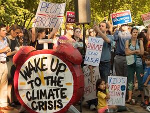 Protesters in Washington DC protest against Donald Trump's decision to withdraw the US from the Paris climate accord on June 2, 2017. (AFP)