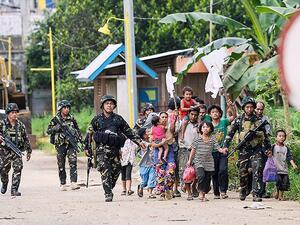 More than 230,000 residents have been displaced and at least 390 people, mostly militants, have been killed in Marawi since May 23, 2017. (AFP)