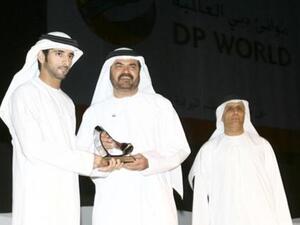 Mohammed Al Muallem, Senior Vice President and Managing Director, DP World, recieving the award from Sheikh Hamdan bin Mohammed bin Rashid Al Maktoum, Crown Prince of Dubai