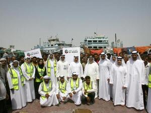 DP World, UAE Region officials with Dhow crew members at the Ramadan event at Al Hamriya Port