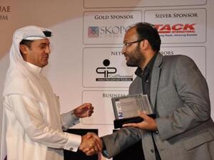 Bin Turkeya, SVP Human Resources, Economic Zones World receiving the GCC Excellence Award