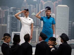 Lizzy Jagger and Lmogen Waterhouse posed in British Airways vintage uniform in Hong Kong
