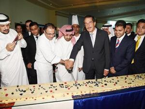 Consul General of France cutting the cake in Jeddah. (SG)