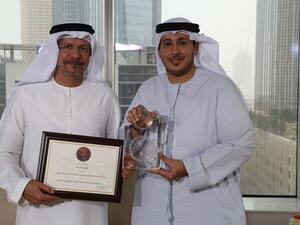 Hussain Al Qemzi, CEO Noor Bank and Waleed Barhaji, Business Head of Consumer Finance, Noor Bank, with the awards at the bank’s headoffice in Dubai