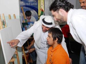 H.E. Sheikh Abdulaziz bin Ali Al Nuaimi during the workshops with children