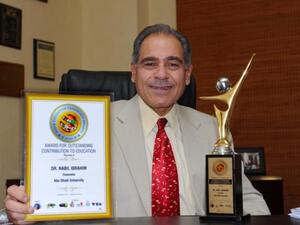 Abu Dhabi University’s Chancellor, Dr. Nabil Ibrahim receiving his award