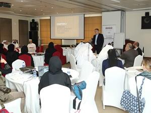 جانب من فعاليات إحدى الدورات السابقة من برنامج إعداد المستشارين المهنيين