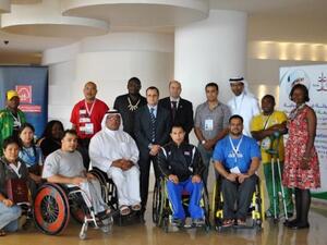Al Bustan officials with players of Special Olympics