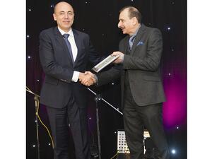 Alaa Youssef, Managing Director – Middle East at SAS receiving the award.