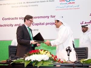 Dr. Andreas Heine, CEO Smart Grid Services, Siemens AG and His Excellency, Dr. Mohammed bin Saleh Al-Sada, Minister of Energy & Industry for Qatar