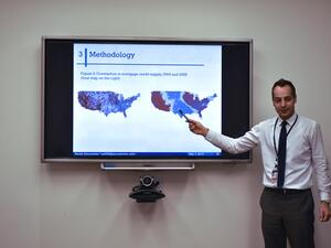 GU-Q professor Alexis Antoniades in the Faculty Research Colloquium session