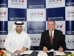 Abdul Baset, Chief Executive of Dubai SME and Howard Gaunt, Head of Business Banking Group, ADCB signing the agreement