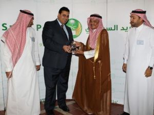 Hesham El Beih, KSA Country Manager Link Development receiving the “IT Partner of Year 2011” award from Dr. Mohammed Banatan, CEO Saudi Post