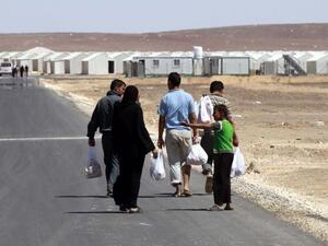 The center will allow Syrian refugees to obtain a one-month leave from the camp and work permit to pursue job opportunities outside the camp. (AFP/ File)
