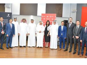 The Minister of Transportation and Telecommunications, H.E. Eng. Kamal bin Ahmed Mohammed and Batelco Chairman Shaikh Mohamed bin Khalifa Al Khalifa with officials from EGovernment, Ericsson and Batelco