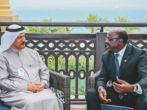 Sultan bin Saeed Al Mansouri meets Mukhisa Kituyi, secretary-general of the UN Conference on Trade and Development, on the sidelines of the World Government Summit in Dubai on Monday. (Courtesy WAM)
