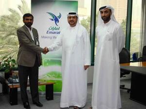 Abdulrahman Qassim Al Ali after the signing of the agreement with Anwar Talkadour in presence of Dhahi Al Muheiri