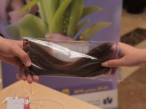 نجحت الحملة التي استمرت على مدار يومين وشاركت فيها موظفات جمارك دبي بتجميع خصل للشعر تجاوزت المترين.