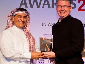 David Butorac, CEO of OSN receiving the awards for OSN