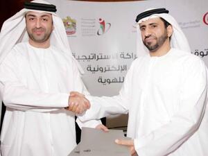 H.E. Ahmed Bin Humaidan, Director General of Dubai eGovernment, and H.E. Dr. Eng. Ali Mohamed Al Khouri, Emirates ID Director General during the signing