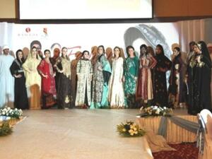 Designer Hoorin Mumtaz with the models