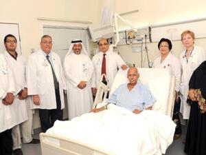 Doctors with patient and his wife at Hamad Medical Corporation