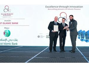 Dr. Adnan Chilwan, Group CEO of Dubai Islamic Bank, receives the awards. 