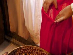 Women celebrating mid Sha’aban by making preparations for Ramadan while children visit homes singing songs and are presented with sweets