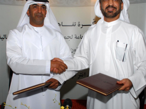 Ahmed Butti Ahmed, Director General of Dubai Customs and CEO of the Ports, Maritime shaking hands with Free Zone Authority and HE Saeed Ahmed Al Muhairi, Director General of Abu Dhabi Customs