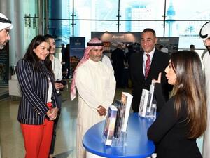 KPC officials visiting Burgan Bank booth.