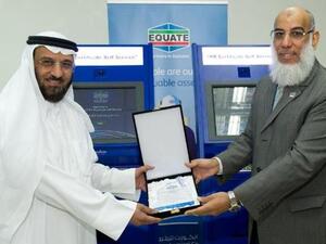 EQUATE President and CEO Mohammad Husain with PACI Deputy Director General Mansour Al-Methen