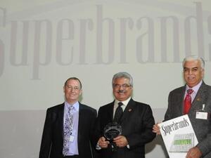 Mr. Mike English, Mr. Deepak Babani and Mr. Niranjan Gidwani at the Superbrands Award Ceremony 2012 in Dubai, UAE