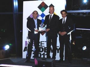 Eros representative receiving the award