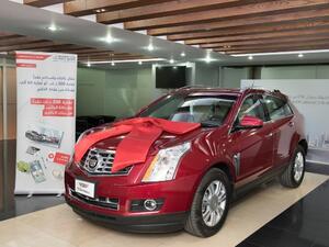 Mariam Adel Fahad Al-Khamees wins a new Cadillac SRX in Gulf Bank’s Red & Salary Account Quarterly draw 