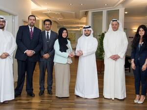 Mr. Khaled Al-Mutawa, General Manager – International Banking and Investments, and Mrs. Mona Mansour, General Manager –Customer Services Delivery accepting the award from Citibank representatives