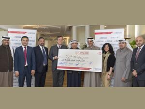 Al Danah Millionaire Mr. Ramadan Ali Hassan Al-Sharah receives his cheque from Gulf Bank’s CEO, Mr César González-Bueno and the bank’s team 