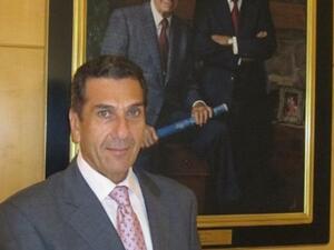 George Aoun, cluster general manager for JW Marriott Kuwait Hotel, holding the award