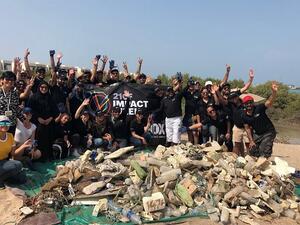 Group Photo During the cleanup at Khor Muzahmi in Mina Al Arab