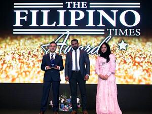 Husam Mahmoud, Marketing Manager, Al Ansari Exchange receiving the recognition at the TFT awards ceremony.