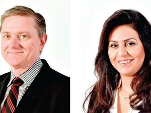 الرئيس التنفيذي لشركة بتلكو المهندسة منى الهاشمي ومدير عام وحدة التسويق، مايكل ستانفورد