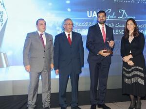 Khalid Al Kayed, CEO of Bank Nizwa receiving the award in Amman.