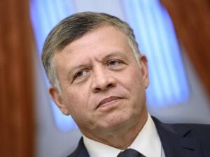 King Abdullah II underlined the need for all state institutions to rationalize spending and balance taxes against the quality of services provided to citizens. (AFP)